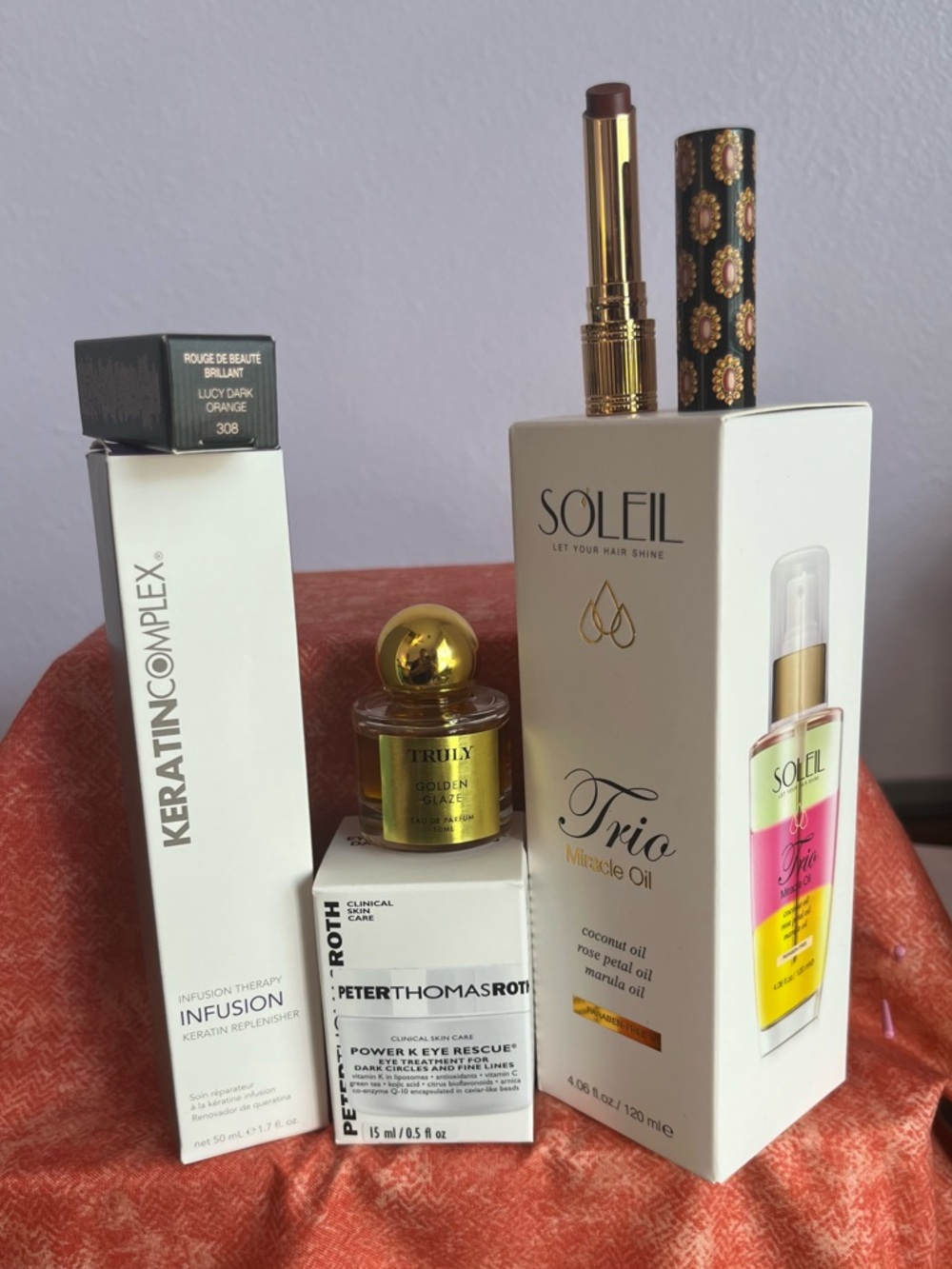 Truly Dabber; Soleil Hair Oil; PTR Eye Cream; Keratin Hair Serum; Gucci Lippy